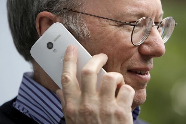 Spy shot shows Google Chairman Eric Schmidt using the Motorola Moto X